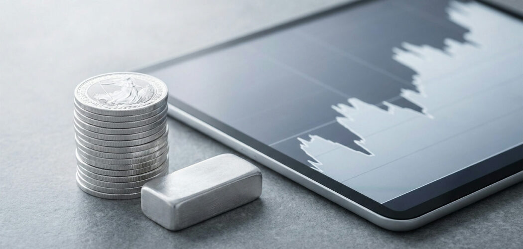 Silver ETF vs physical silver: silver coins and a bar beside a tablet showing a silver price chart